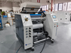 Stretch film rewinder and slitter